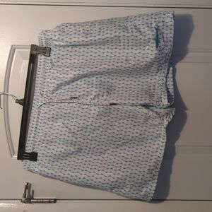 Blue and white swimming trunks